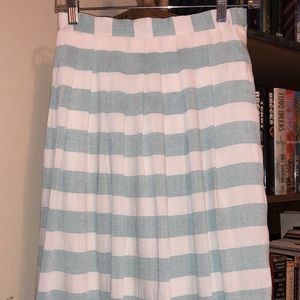Mid length cream and blue skirt
